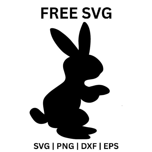 Black bunny silhouette standing up on its hind legs in side view with tall upright ears and front paws raised, free Easter bunny SVG cut file preview.