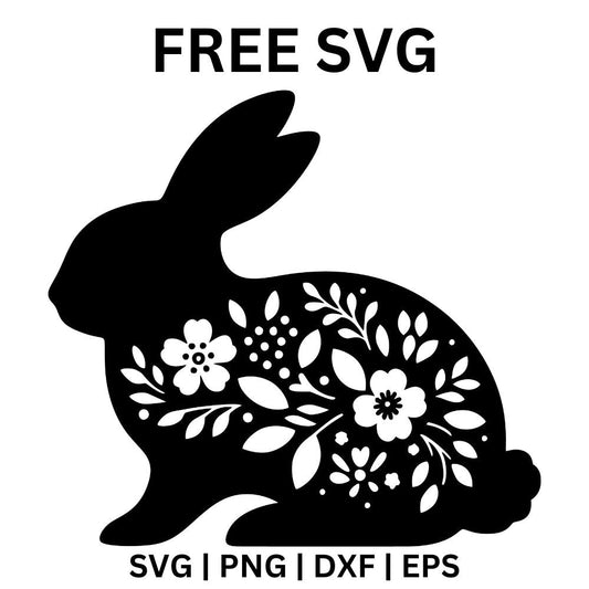 Black sitting bunny silhouette with white flowers and leaves cut out across its body, free floral Easter bunny SVG cut file preview.
