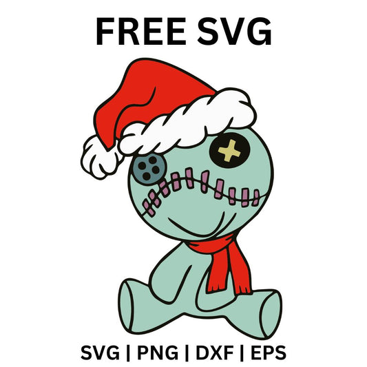 Stitched green rag doll with button eyes wearing a Santa hat and red scarf, sitting with a little smile, free Christmas rag doll SVG cut file preview.